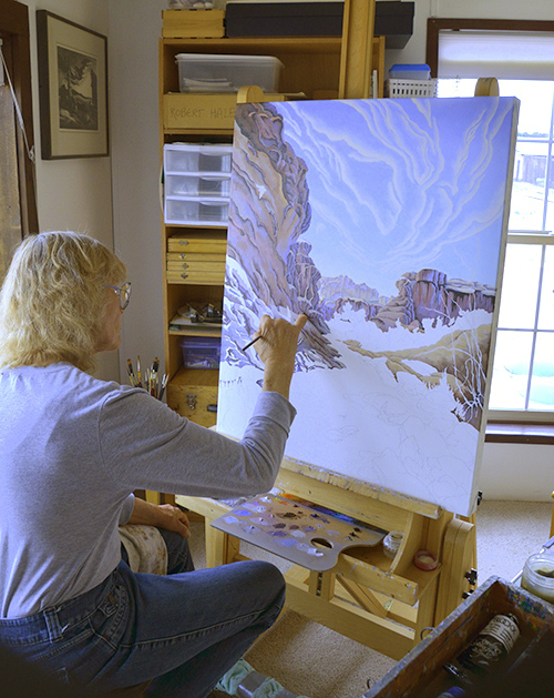 Paula painting in her studio